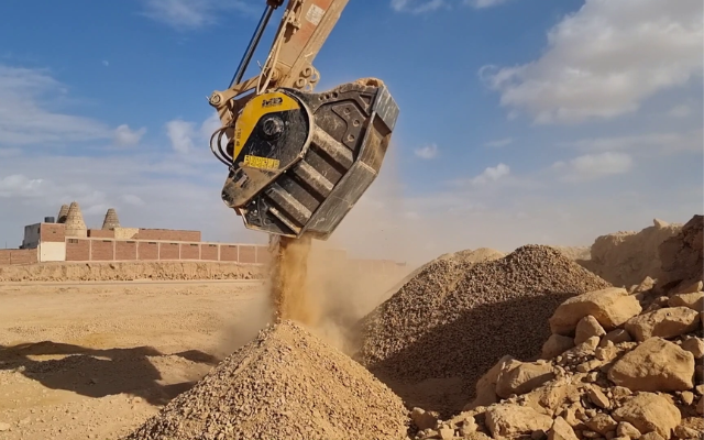 MB jaw crusher bucket saved time and effort by crushing demolition rubble for road backfill during a farm project in South Africa.