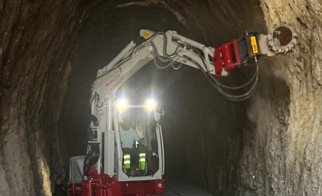MB Crusher's MB-R500 cutter renovated a Dalmatian white stone tunnel, saving time with smooth results. It's installed on a Takeuchi TB290.